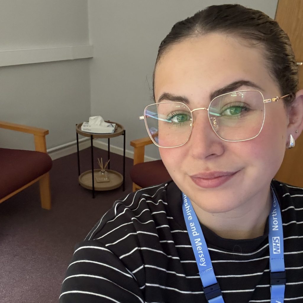 Chloe Burrill, qualified therapist at Therapy with Chloe, in her NHS Counselling room.
